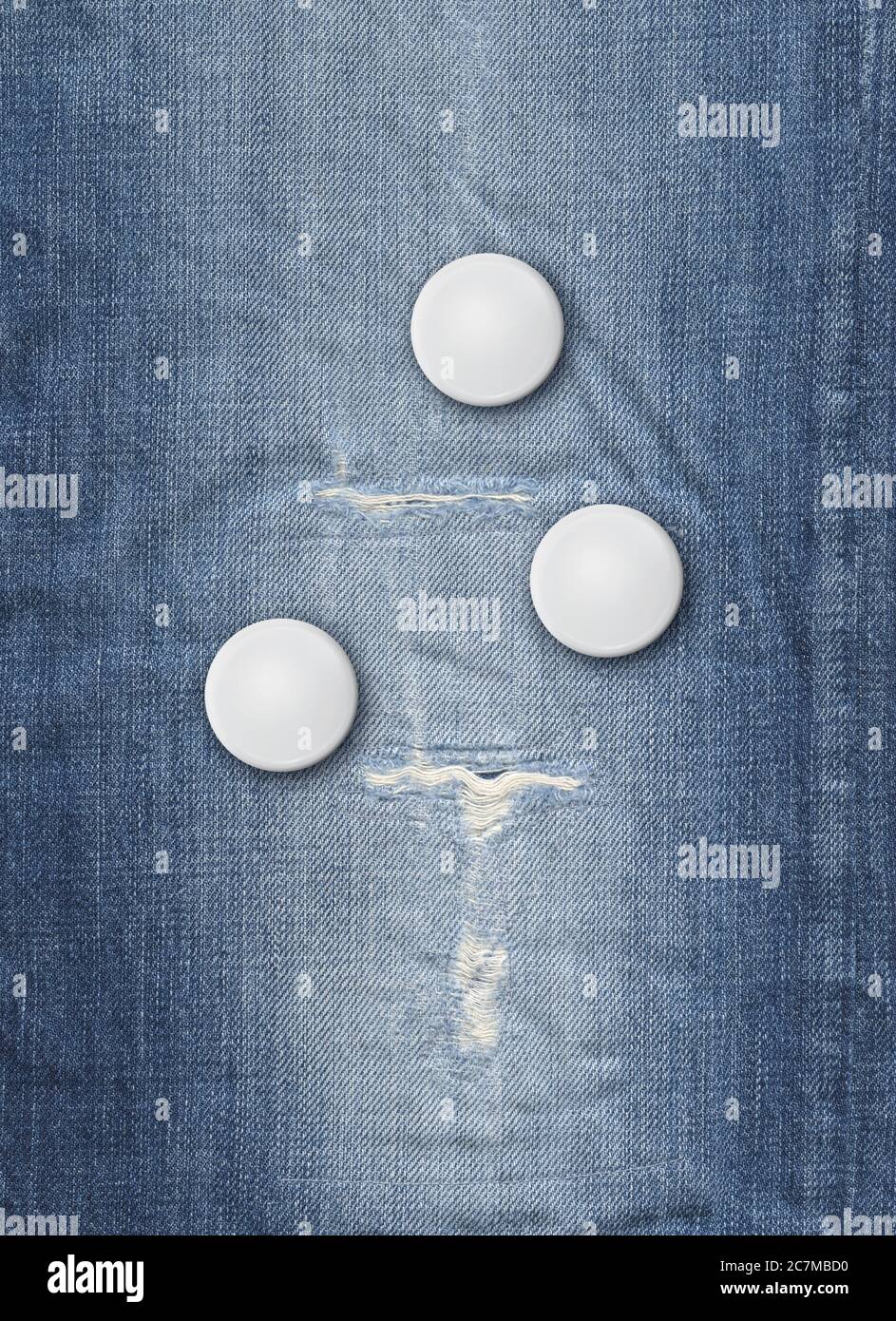 Three blank badges on a blue denim background Stock Photo