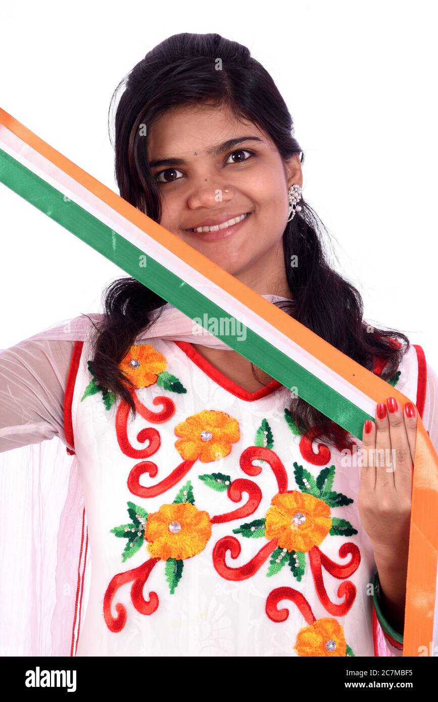 Indian girl standing with Indian flag or tricolor on white background