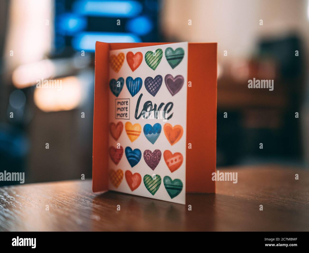Colorful copybook with hearts and love written on it Stock Photo