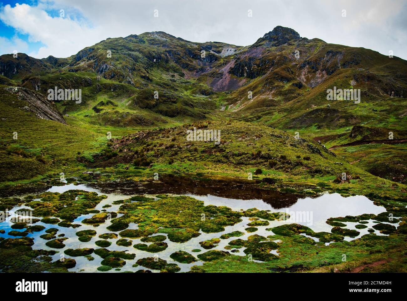 mountain landscape with pond, Chaullacocha village, Andes Mountains, Peru, South America Stock Photo