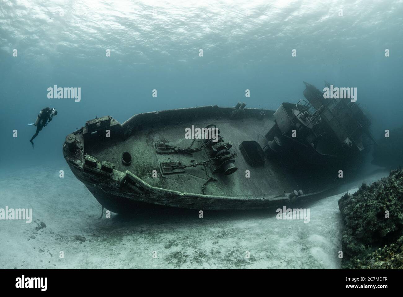 Divers examining the famous USS Kittiwake submarine wreck in the Grand Cayman Islands Stock Photo