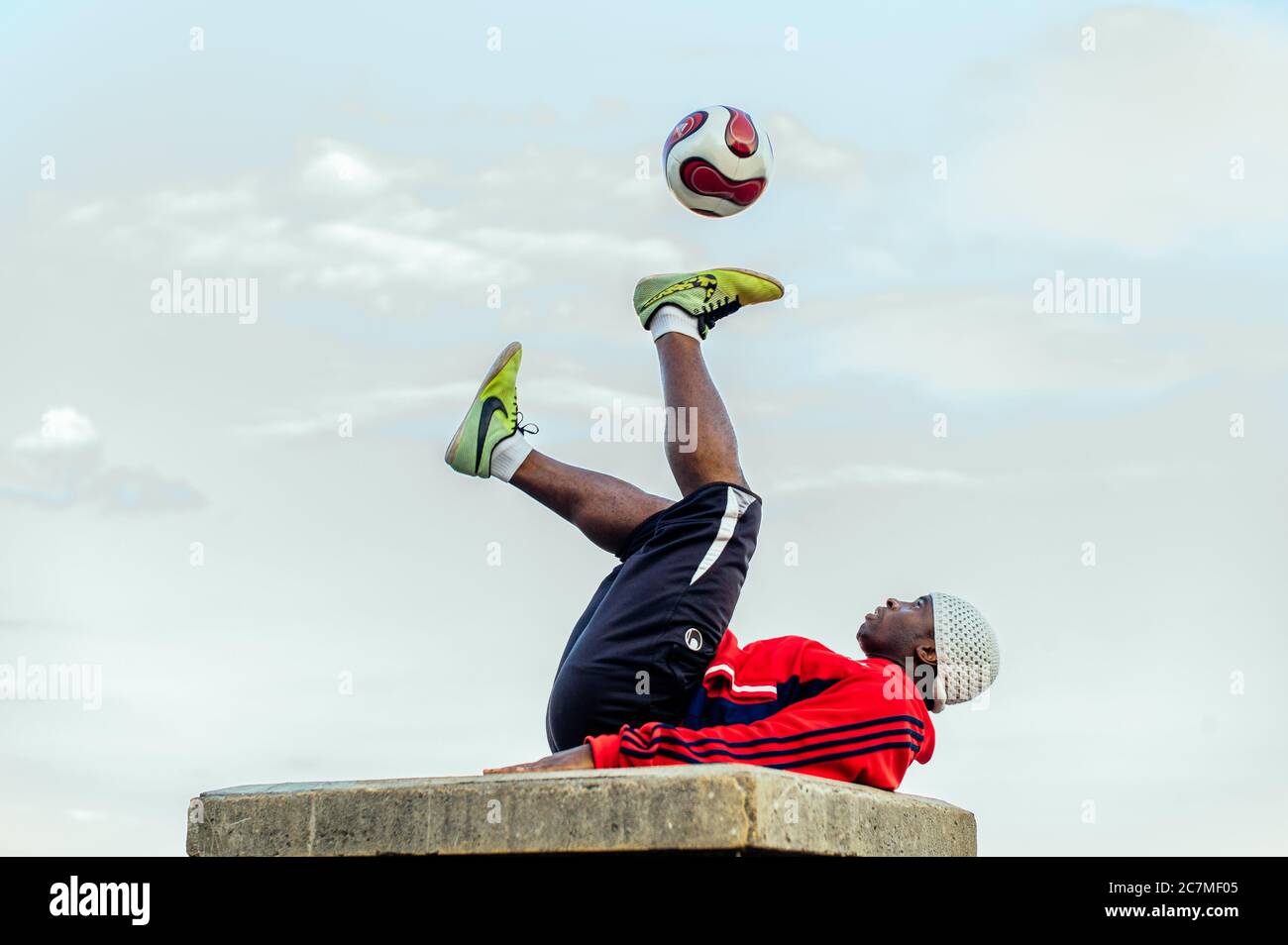 PARIS, FRANCE - Jul 13, 2019: A series of images showing a young man  performing a show with his football in front of the Sacre Coeur Church in  Montmar Stock Photo - Alamy
