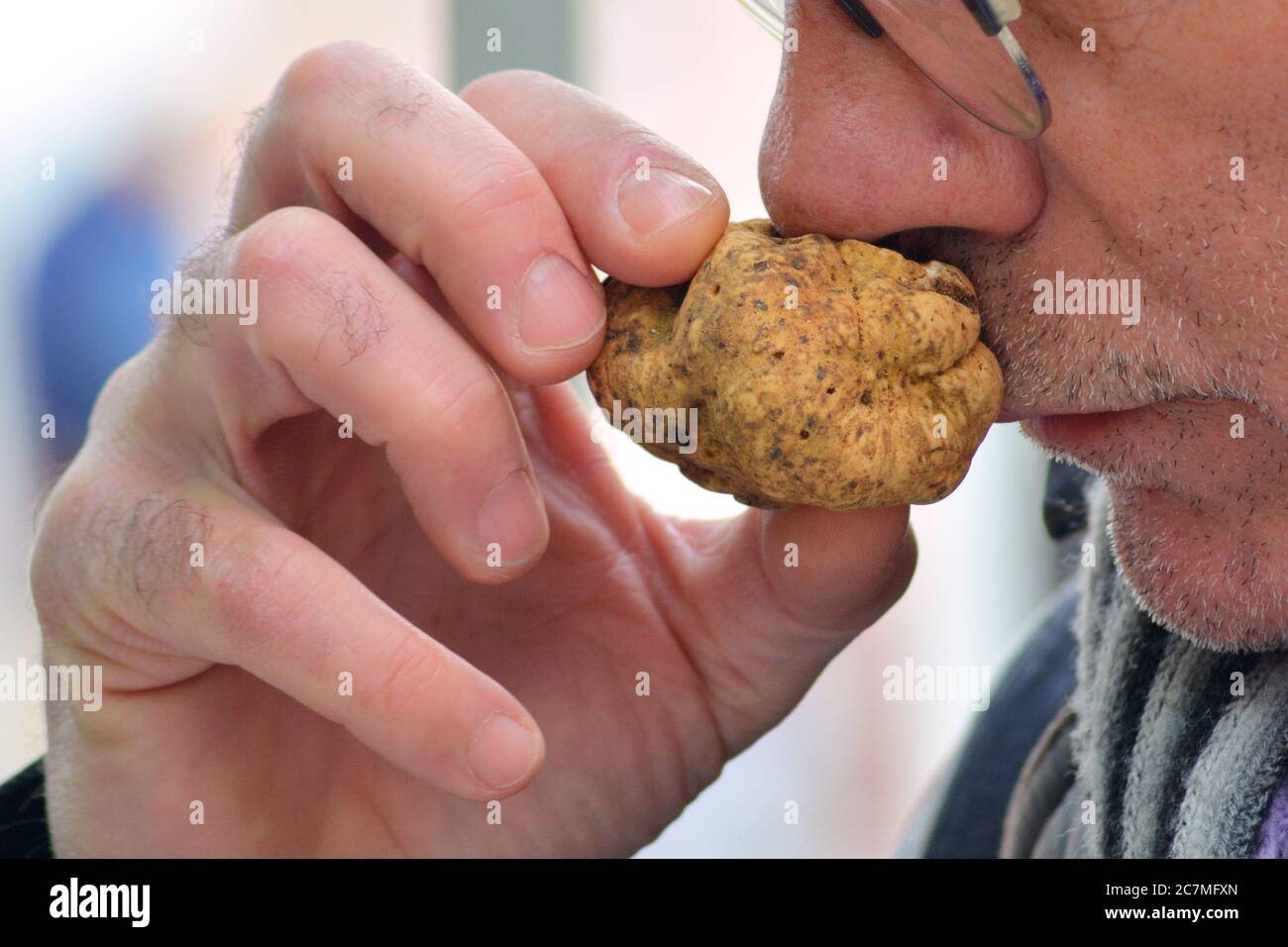 A buyer smell a white truffle Stock Photo Alamy