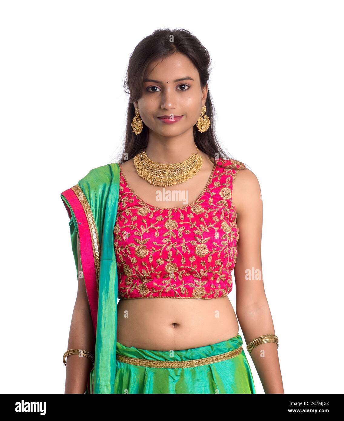 Beautiful Indian traditional girl posing on white background Stock