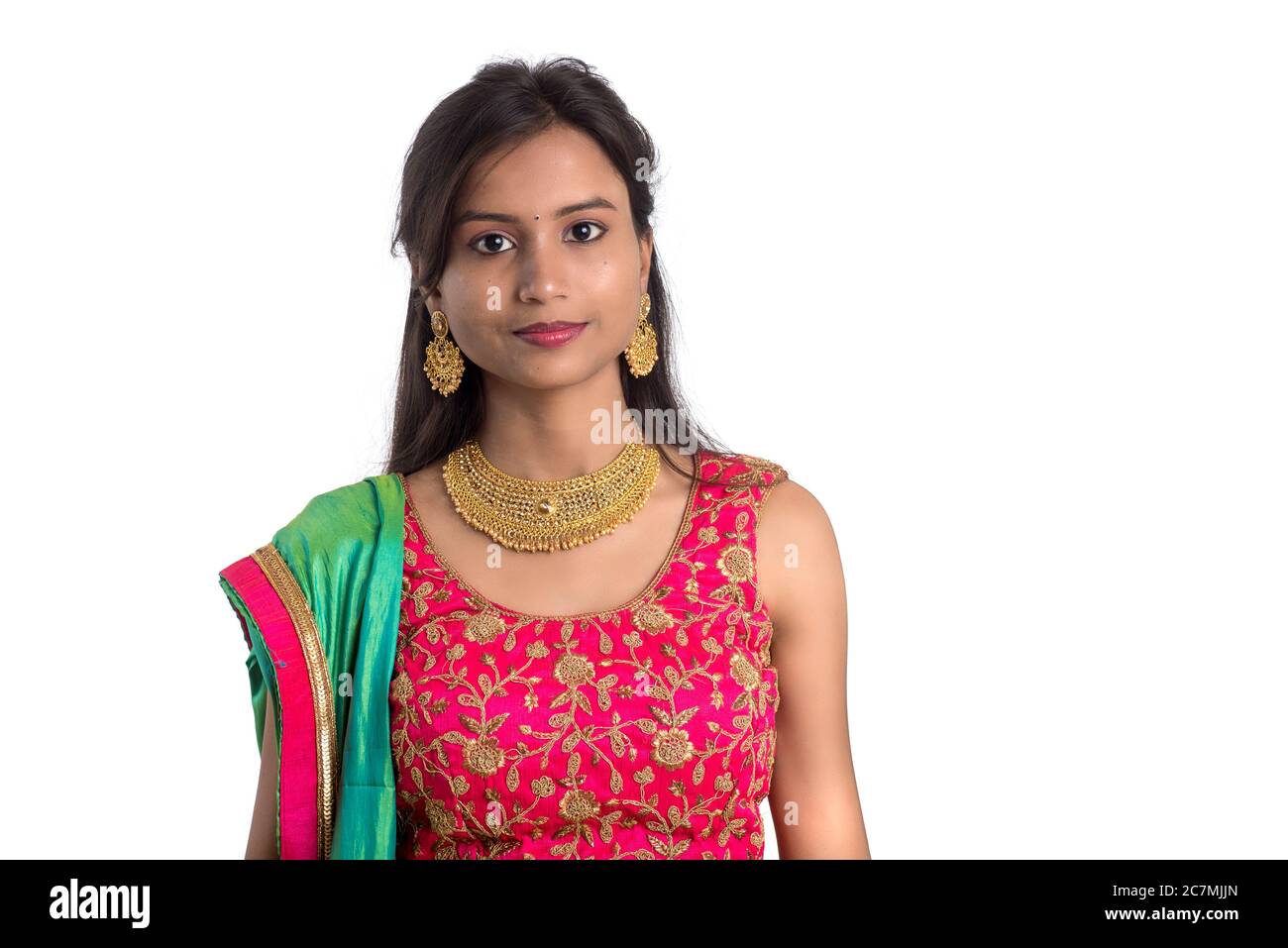 Beautiful Indian traditional girl posing on white background Stock