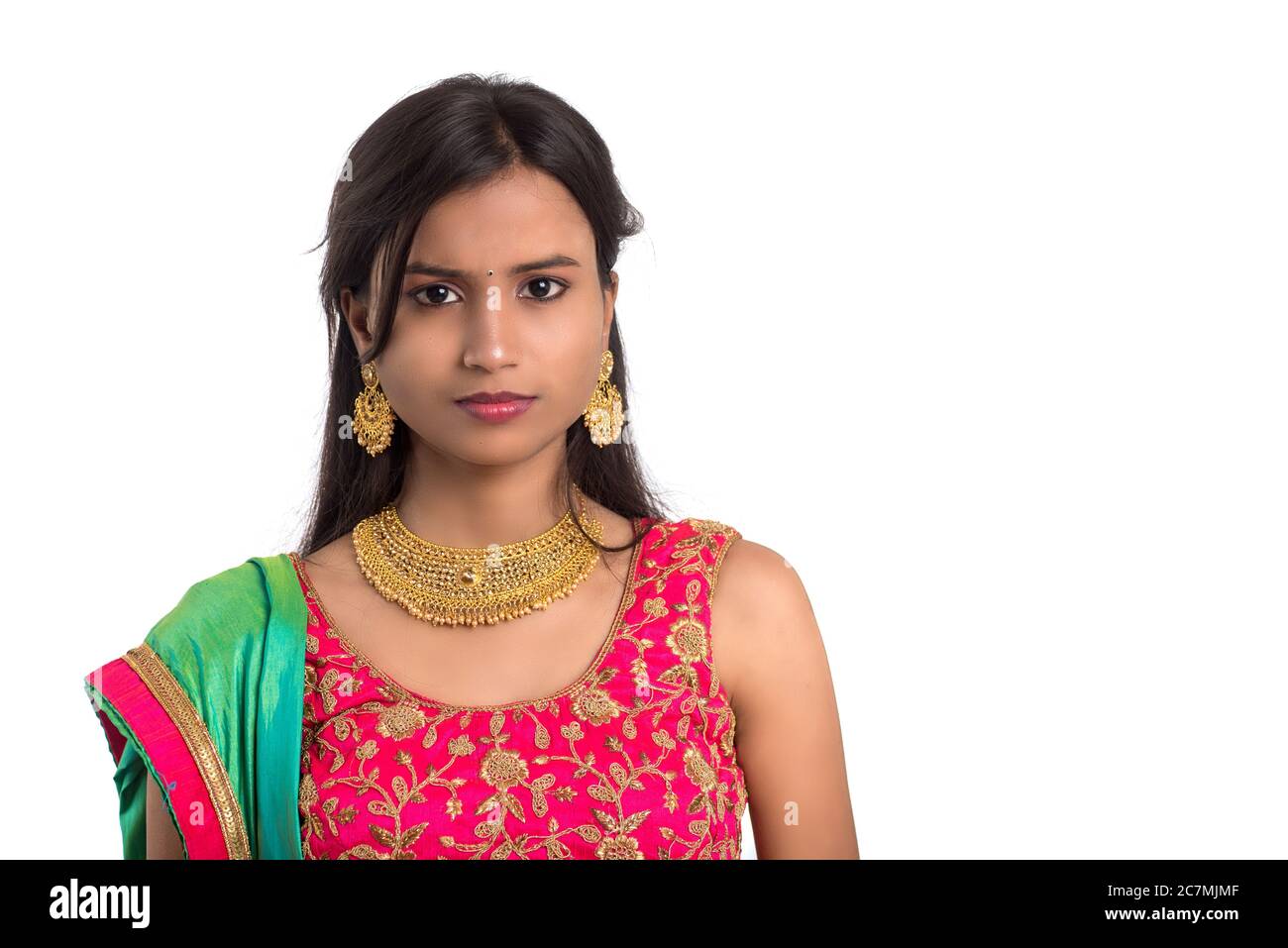 Beautiful Indian traditional girl posing on white background Stock
