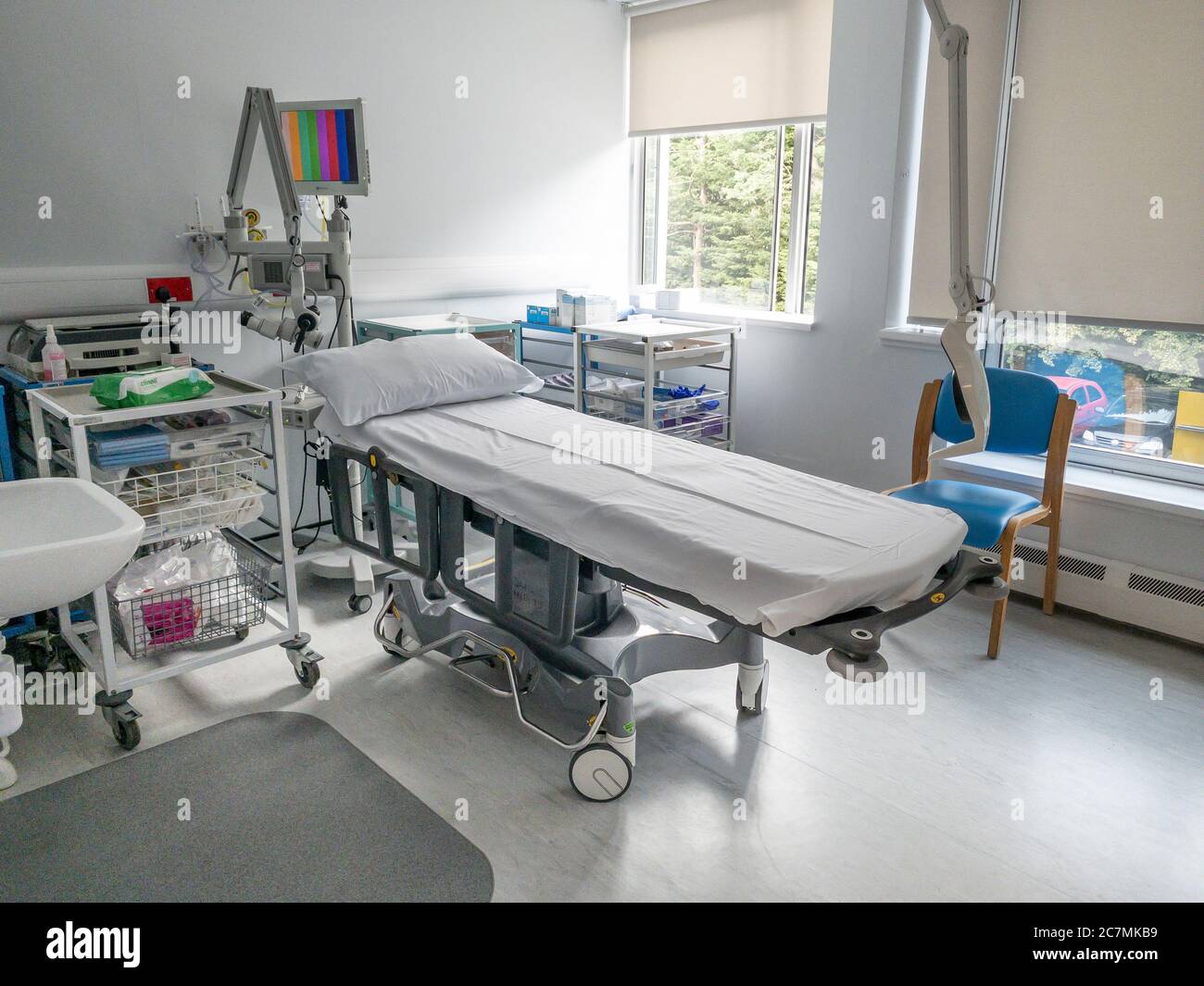 Stretcher in assessment and treatment room of hospital Stock Photo