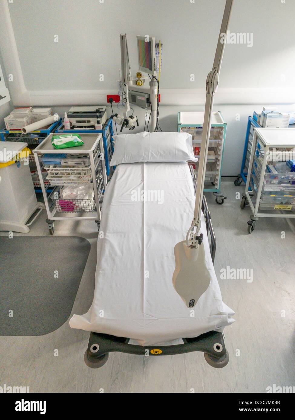 Stretcher in assessment and treatment room of hospital Stock Photo