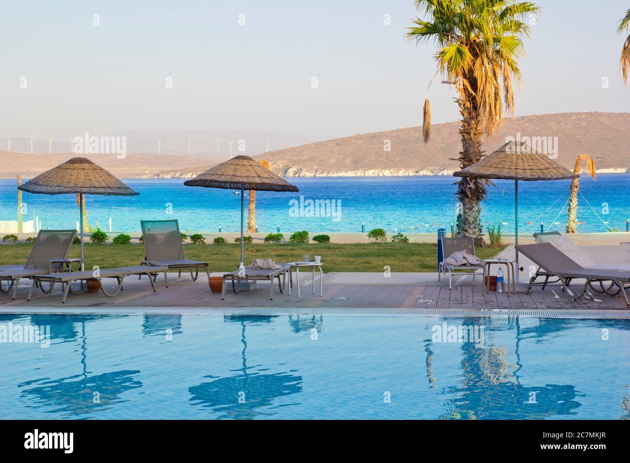 blue and turquoise sea and swimming pool in the hotel Stock Photo