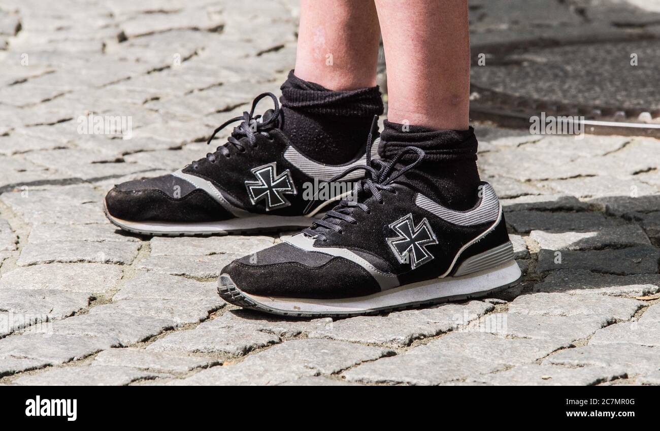 Munich, Bavaria, Germany. 18th July, 2020. Sneakers with the Iron Cross  worn by neonazis at a demonstration in Munich. The wearing of such items  also points to a proliferation in the nazi