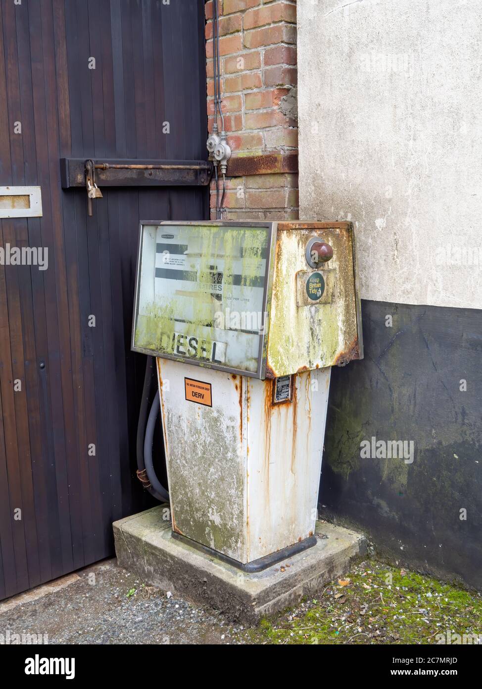 HOLSWORTHY, DEVON, UK - JULY 16 2020: An old diesel pump distributor rusting. Stock Photo
