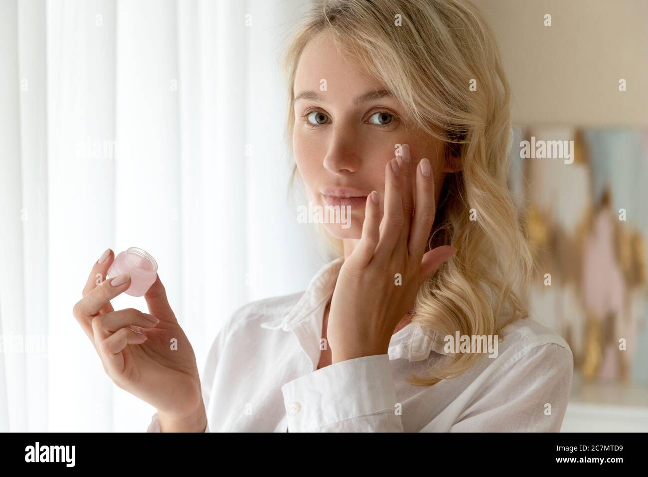 Bedroom face woman cream hi-res stock photography and images - Alamy
