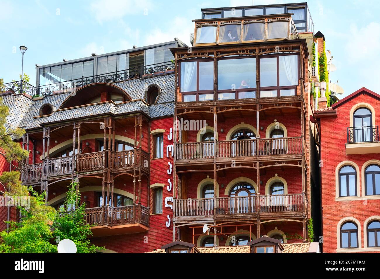 Tbilisi, Georgia - April 29, 2017: Traditional house with wooden carving balcony in Old Town Stock Photo