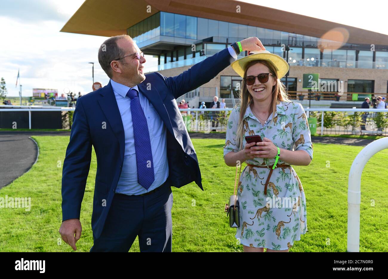 Trainer Ger Lyons and daughter Kerri Lyons after Even So won the Juddmonte Irish Oaks (Group 1) at Curragh Racecourse. Stock Photo