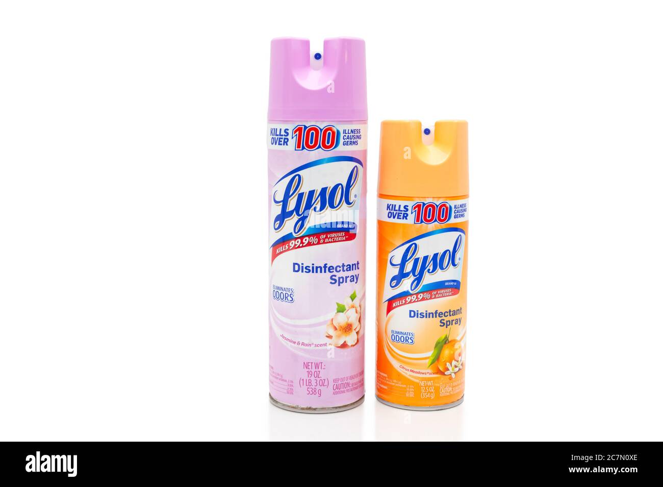 Two cans of Lysol disinfectant spray one pink, one orange Stock Photo