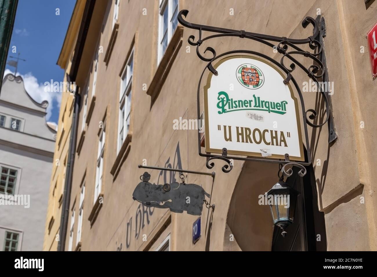 PRAGUE, CZECH REPUBLIC - JULY 12, 2020: Signboard of the U Hrocha pub in the Thunovska street Stock Photo