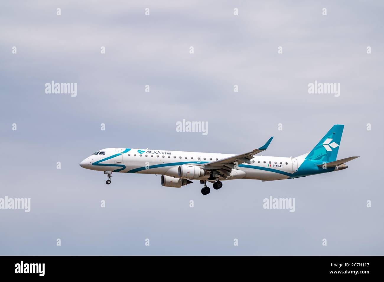 Air Dolomiti Embraer ERJ195LR / E195 I-ADJU in landing configuration on approach to land at Frankfurt airport in Germany Stock Photo