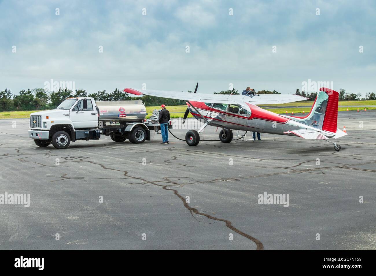 Refueling Cessna single-engine airplane at Brenham Municipal Airport near Brenham, Texas. Stock Photo