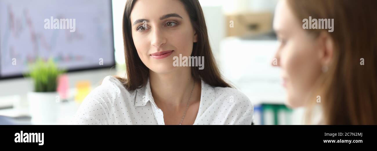 Smart woman at negotiations Stock Photo