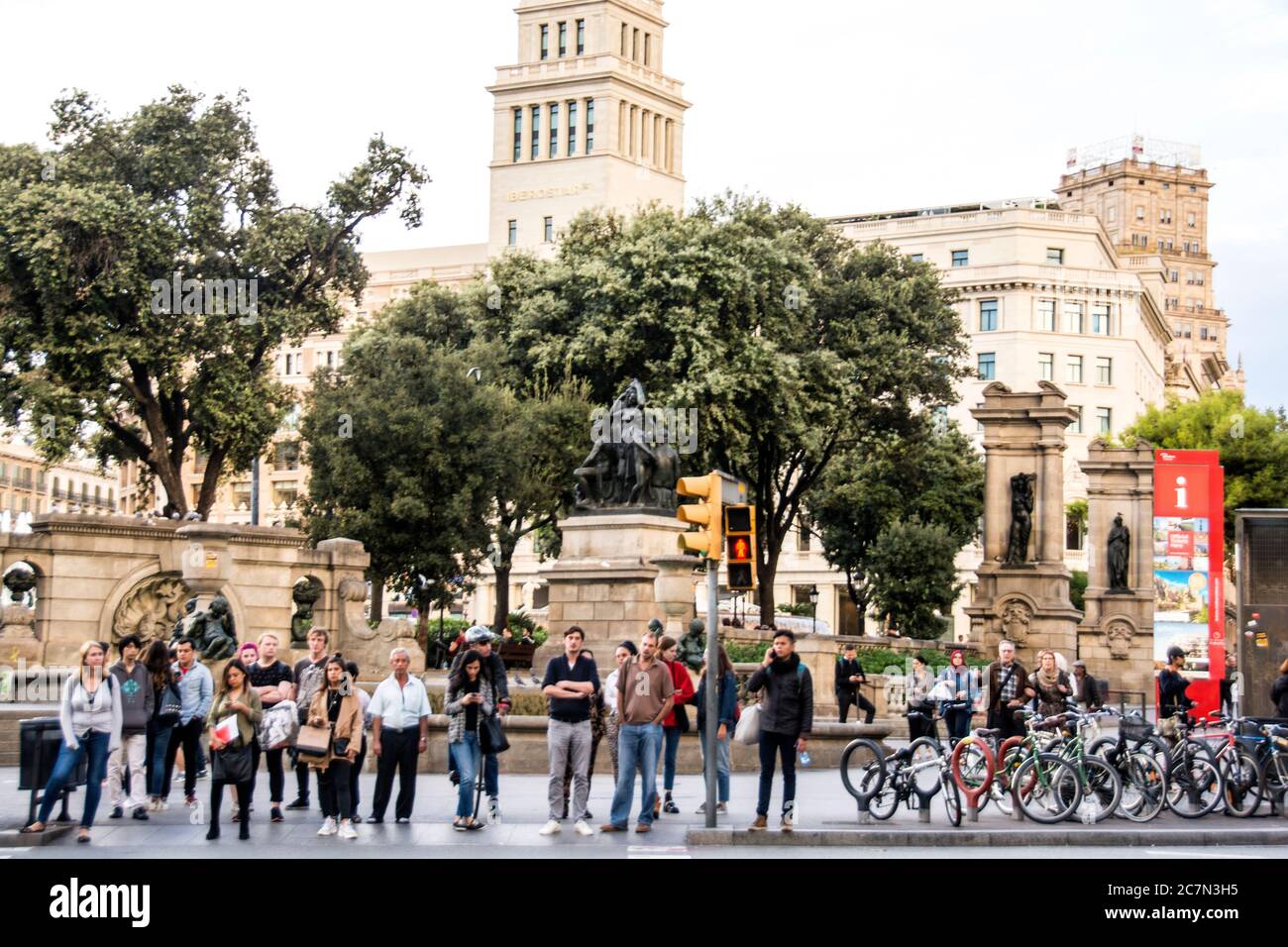 Bikers and walkers at the Plaza de Cataluna, Barcelona, Spain. Stock Photo