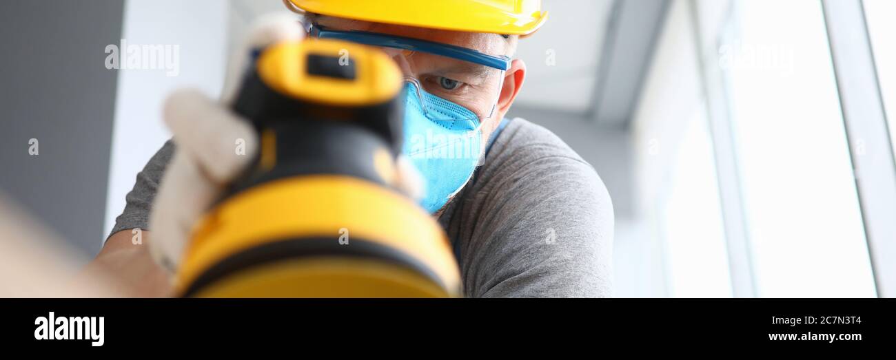Concentrated man in face mask Stock Photo
