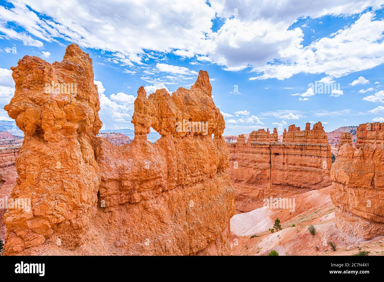 High angle above aerial view of hoodoos orange rock formations at Bryce Canyon National Park in Utah Queens Garden Navajo Loop trail Stock Photo