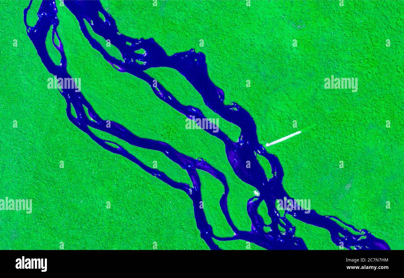 High resolution satellite image showing areas of pure and virgin tropical forest and a river running through it. data sentinel Stock Photo