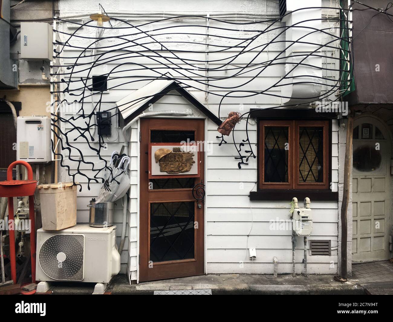 Tokyo, Japan - 15 August 2019: House facade with art elements in bohemian neighbourhood Shimokitazawa,  Setagaya. Stock Photo