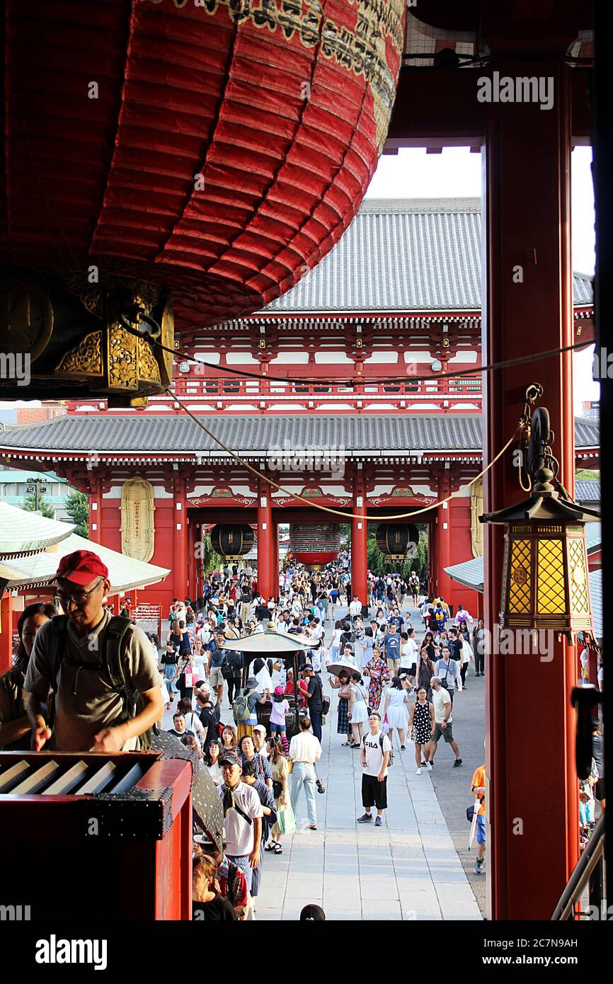 Man visiting Asakusa temple in Tokyo. Stock Photo