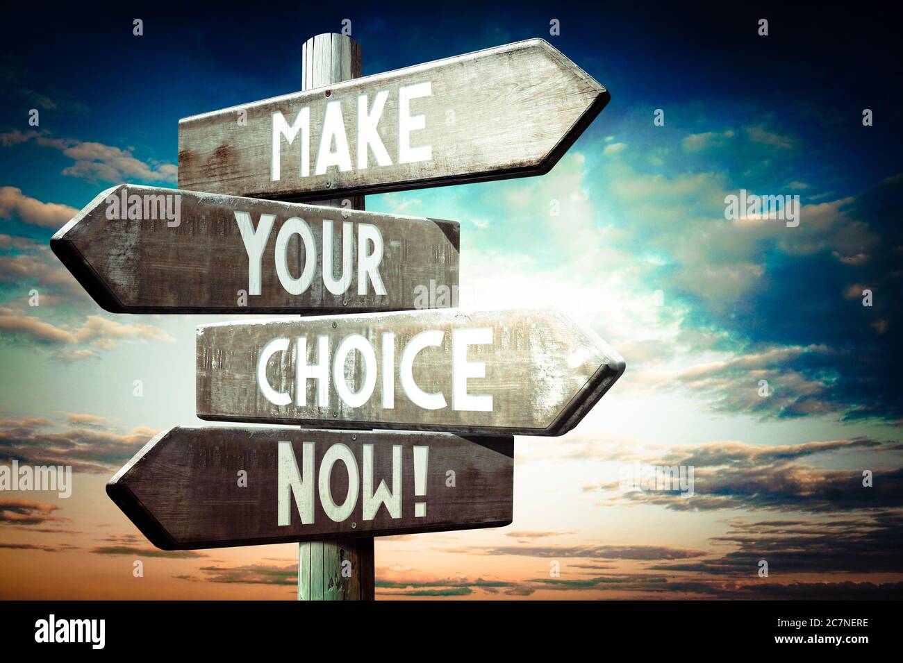 Make your choice now! - wooden signpost, roadsign with four arrows ...