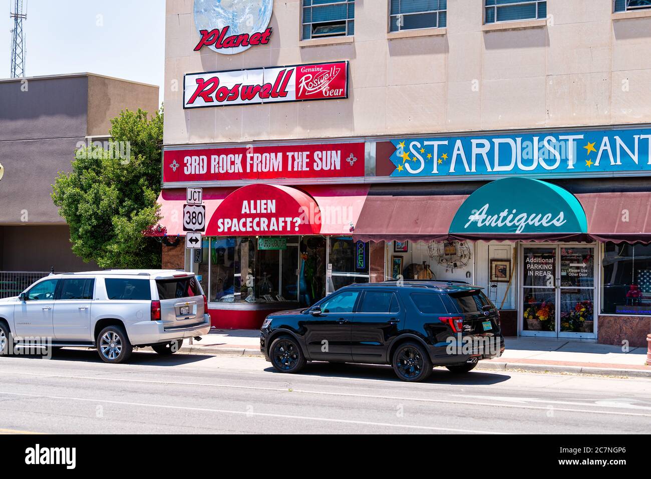 Roswell, USA - June 8, 2019: Main street road in New Mexico famous tourist town city for alien sightings and antique store shop with ufo souvenirs Stock Photo