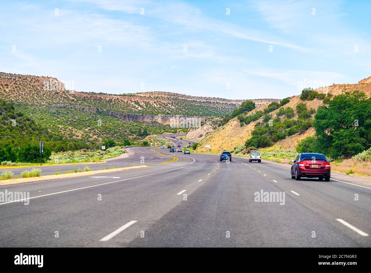 Santa Fe, USA - June 17, 2019: New Mexico desert with cars on road highway to Los Alamos driving with street 502 west and Bandelier National Monument Stock Photo