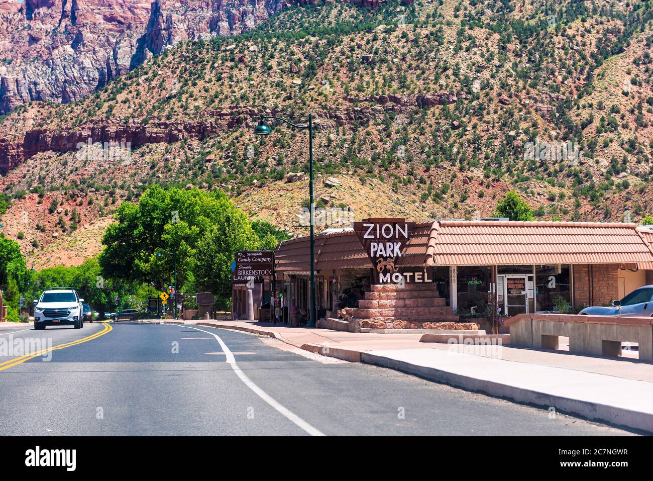 Springdale, USA - August 5, 2019: Zion National Park road street in Utah and town city sign for motel hotel lodging accommodation Stock Photo