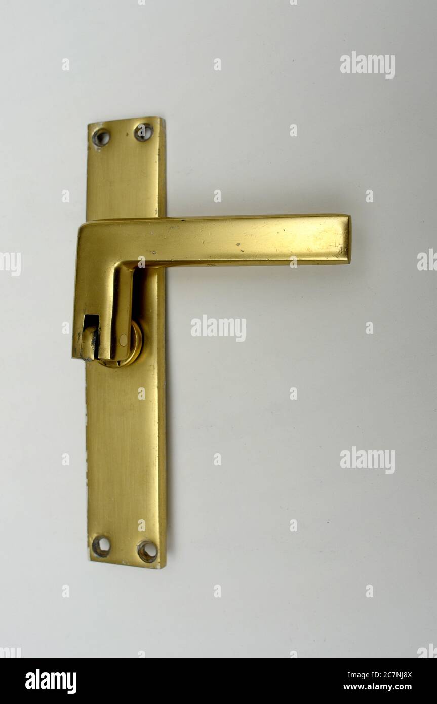 folding door handle clearly used Stock Photo - Alamy