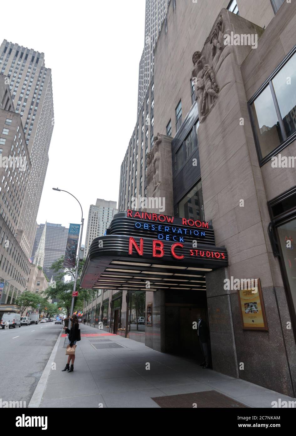 neon sign over the entrance to the Rainbow Room, Observation Deck, and NBC Studios at Rockefeller Center or Centre Stock Photo