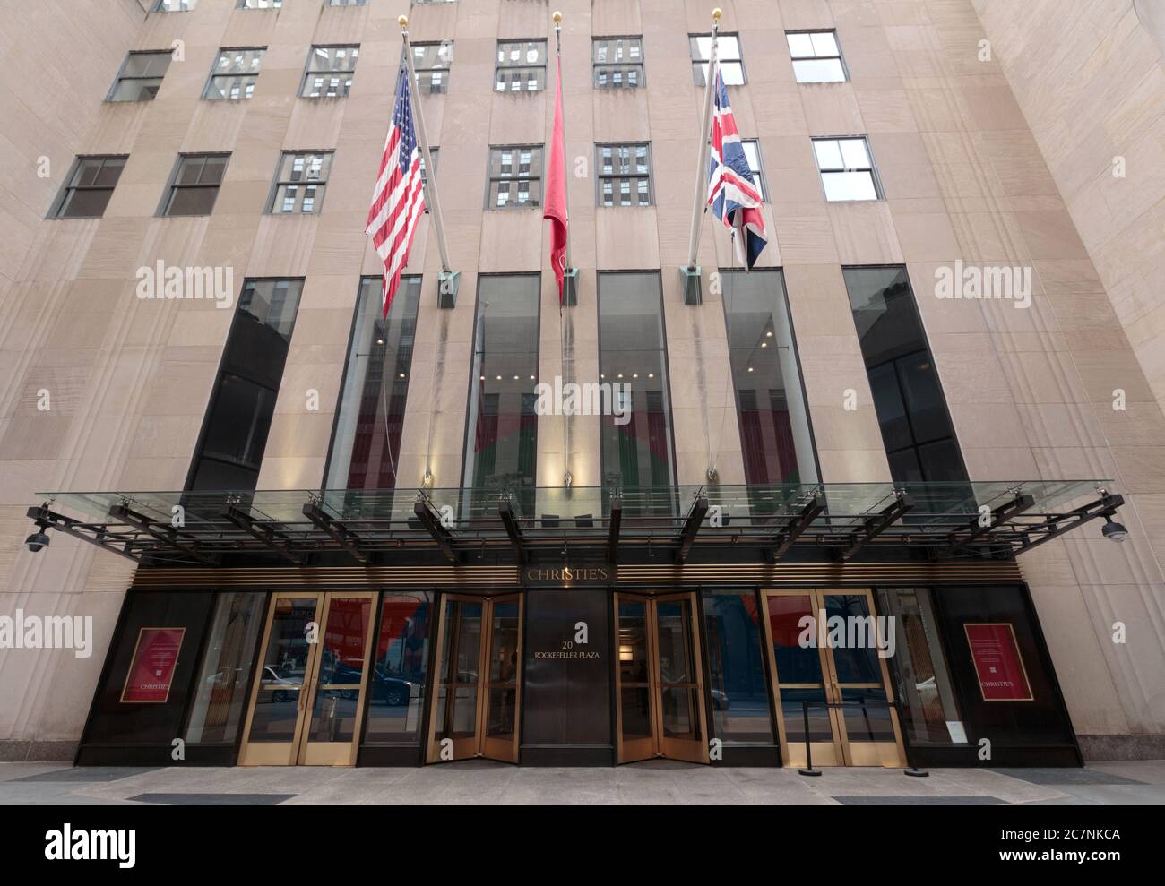 entrance to Christies Auction House in Rockefeller Center in Manhattan, closed for regular business during the coronavirus or covid-19 pandemic Stock Photo