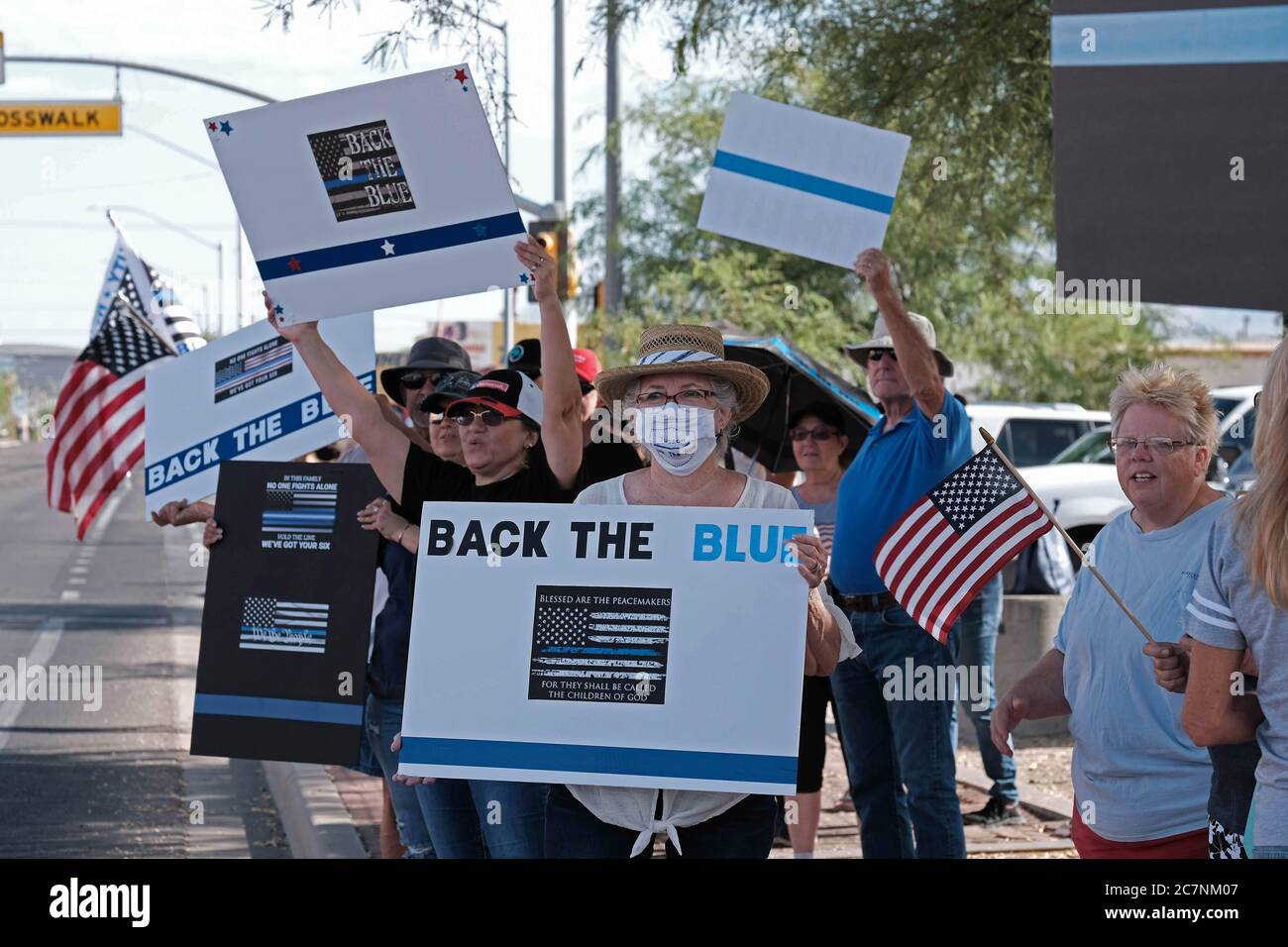 Tucson, Arizona, USA. 18th July, 2020. Members of Back The Blue hold a  rally to support the Tucson police department . The pro police organization  was started by Tim Cesolini who had