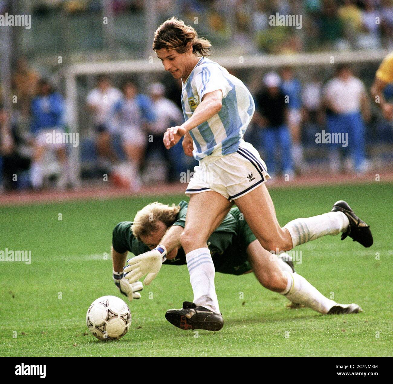 Claudio Paul Caniggia  (Argentina) scores against Claudio Taffarel (Brazil). Italy 90 FIFA World Cup. Stock Photo