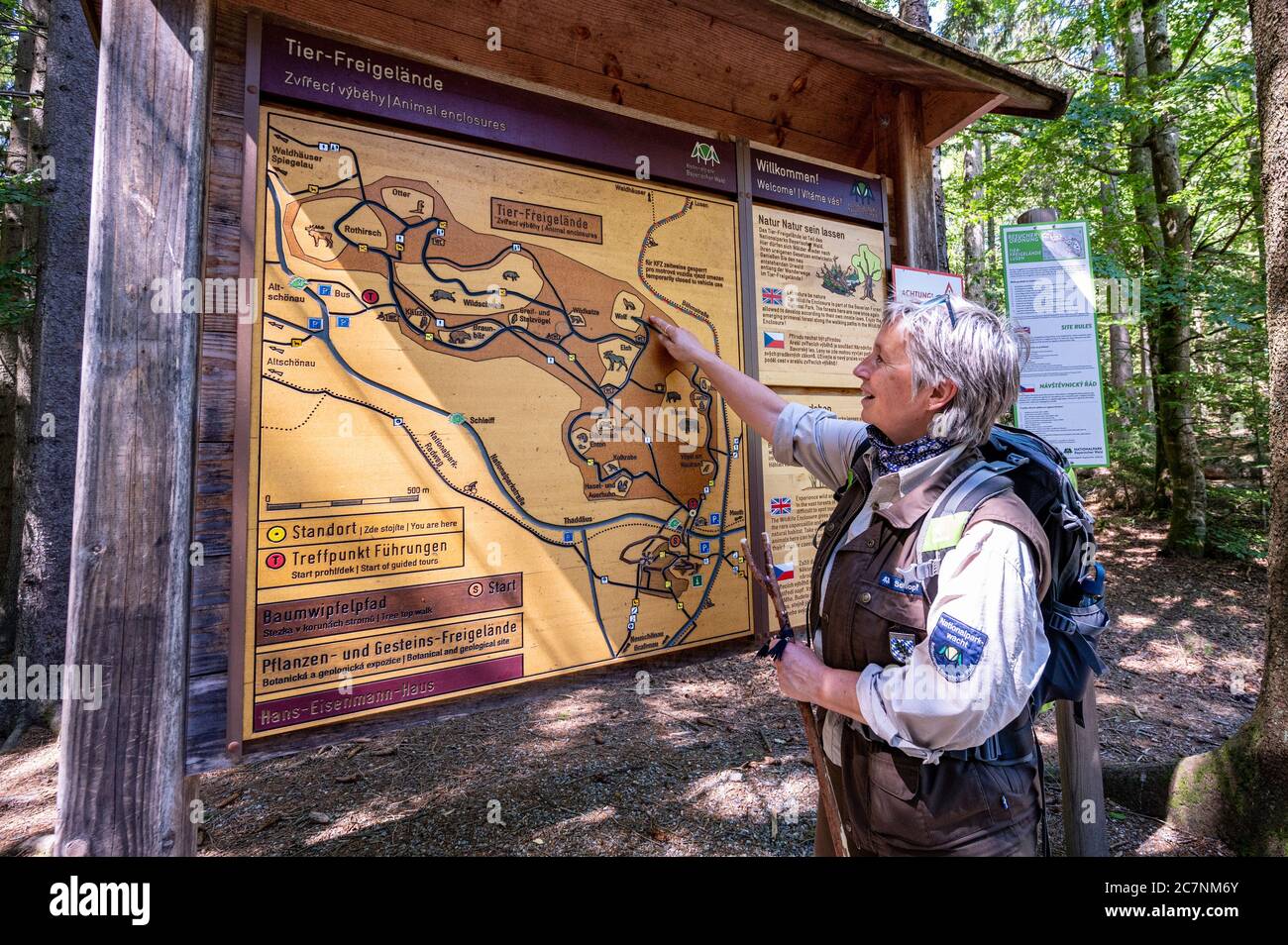 12 June Bavaria Neuschonau Christine Schopf Ranger In The Bavarian Forest National Park Is Standing In Front Of A General Map In Front Of The Animal Enclosure The Corona Crisis Has