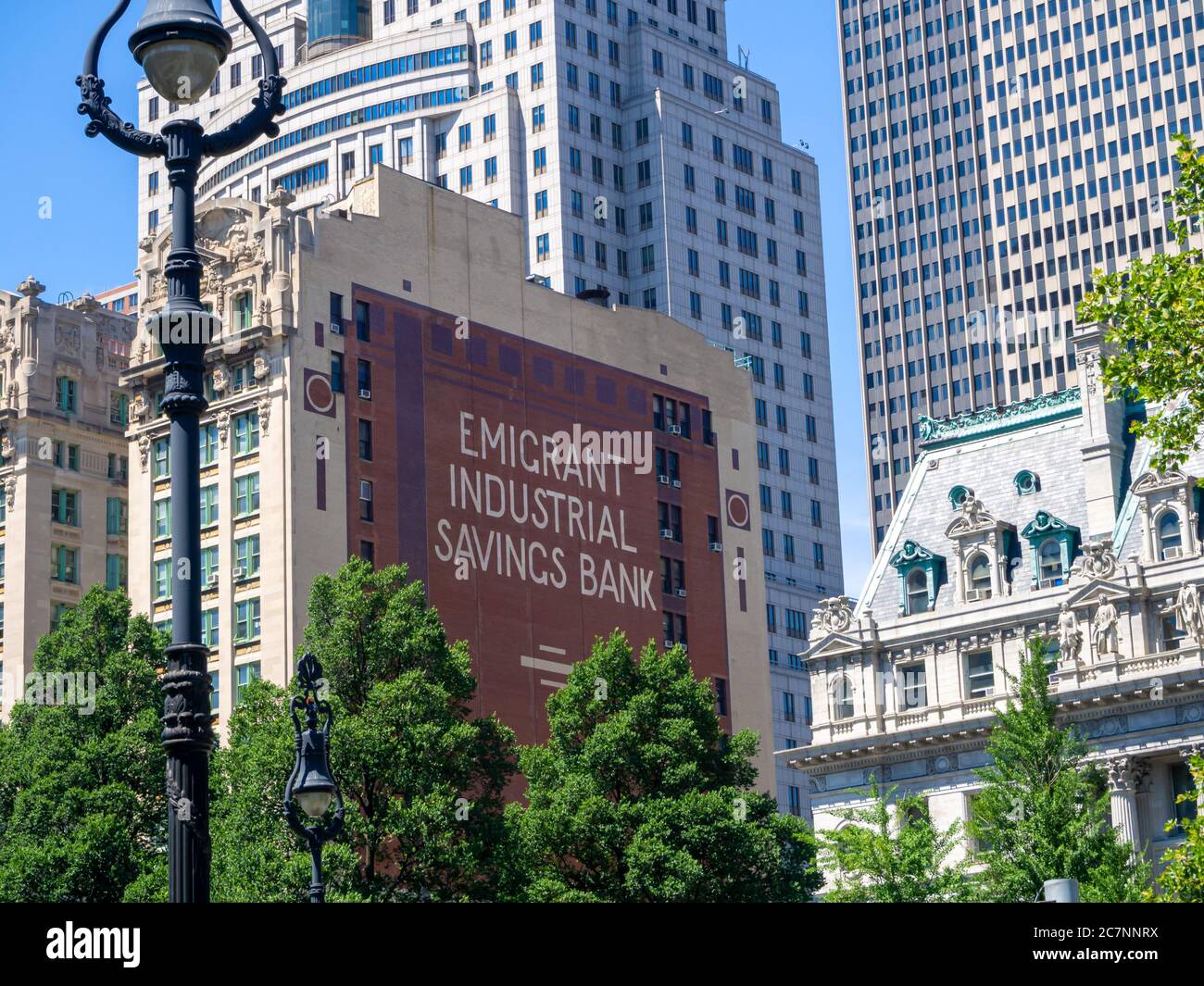 Emigrant Industrial Saving Bank advertisement on side of building