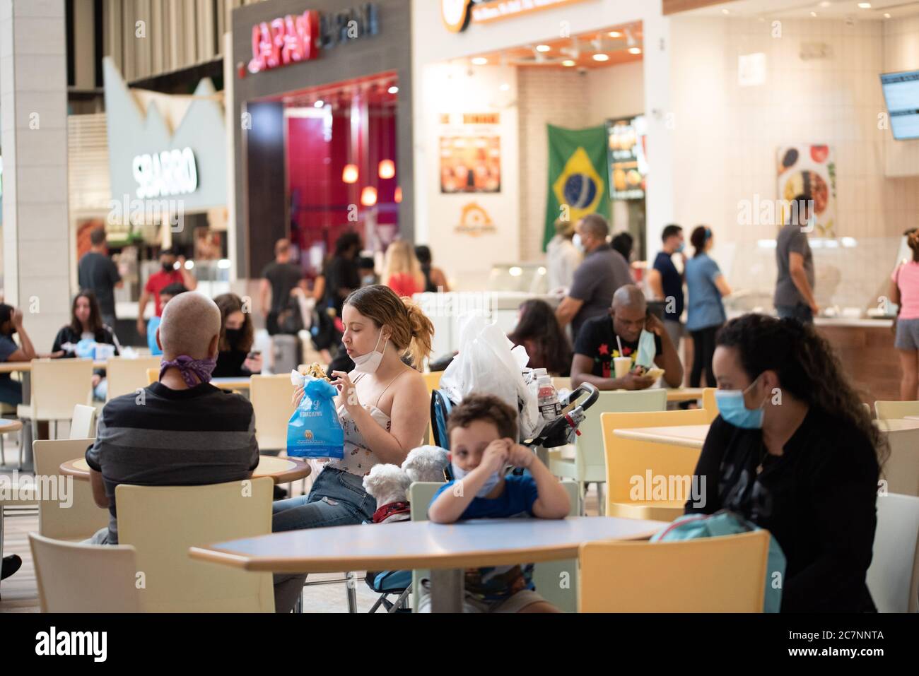 Sunrise, Florida, USA. 18th July, 2020. Shoppers dine at the food court at Sawgrass Mills Mall in Florida despite record high number of new Covid-19 cases in the state this week Credit: Orit Ben-Ezzer/ZUMA Wire/Alamy Live News Stock Photo