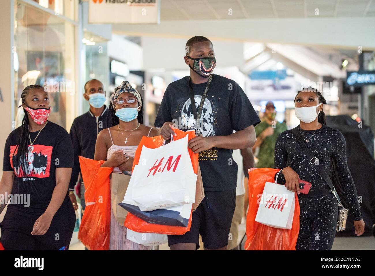 Sunrise, Florida, USA. 18th July, 2020. People shop at Sawgrass Mills Mall in Florida despite record high number of new Covid-19 cases in the state this week Credit: Orit Ben-Ezzer/ZUMA Wire/Alamy Live News Stock Photo