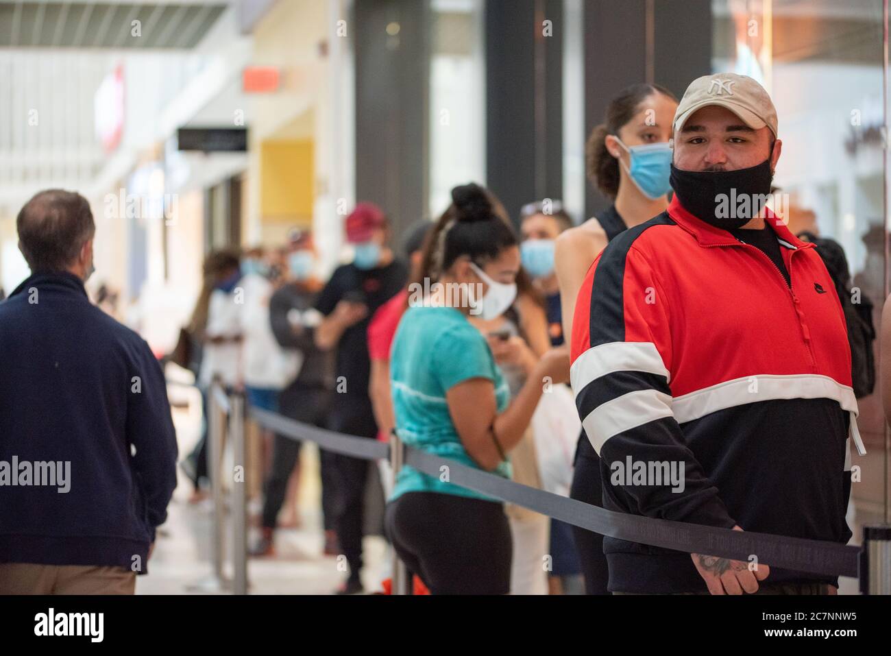 Sunrise, Florida, USA. 18th July, 2020. People shop at Sawgrass Mills Mall in Florida despite record high number of new Covid-19 cases in the state this week Credit: Orit Ben-Ezzer/ZUMA Wire/Alamy Live News Stock Photo