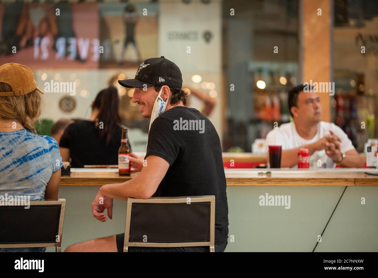 Sunrise, Florida, USA. 18th July, 2020. Shoppers dine at the food court at Sawgrass Mills Mall in Florida despite record high number of new Covid-19 cases in the state this week Credit: Orit Ben-Ezzer/ZUMA Wire/Alamy Live News Stock Photo