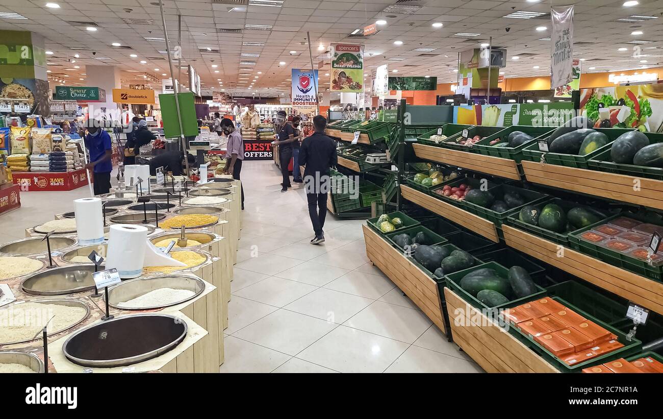 Spencer store interior view with grocery items and vegetables inside a