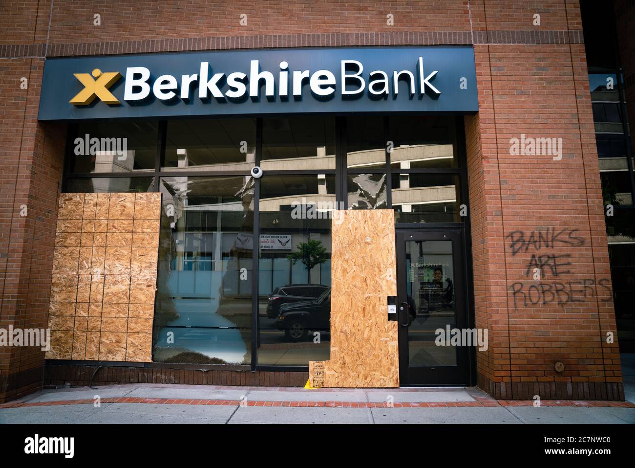 ALBANY, NEW YORK, UNITED STATES - May 31, 2020: A boarded up bank that was vandalized during race riots following the death of George Floyd in Albany, Stock Photo