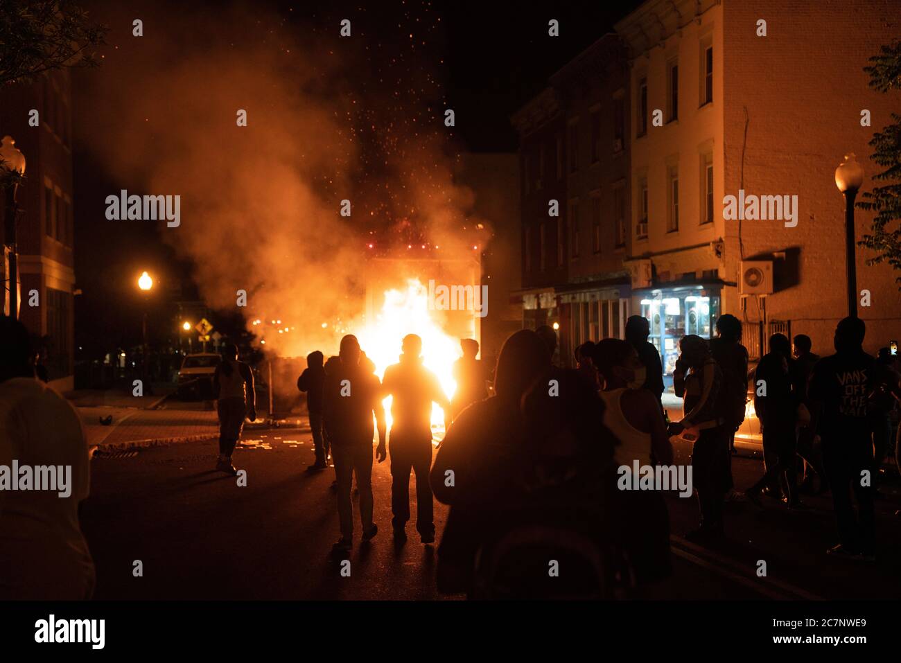 ALBANY, NEW YORK, UNITED STATES - May 30, 2020: Protesters light fires ...