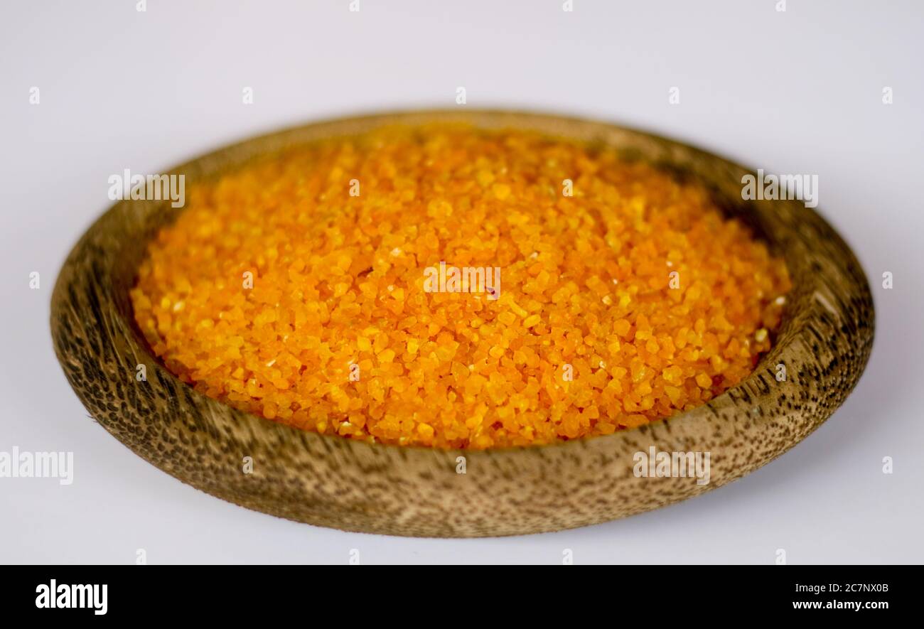 Yellow corn grits on white background Stock Photo Alamy