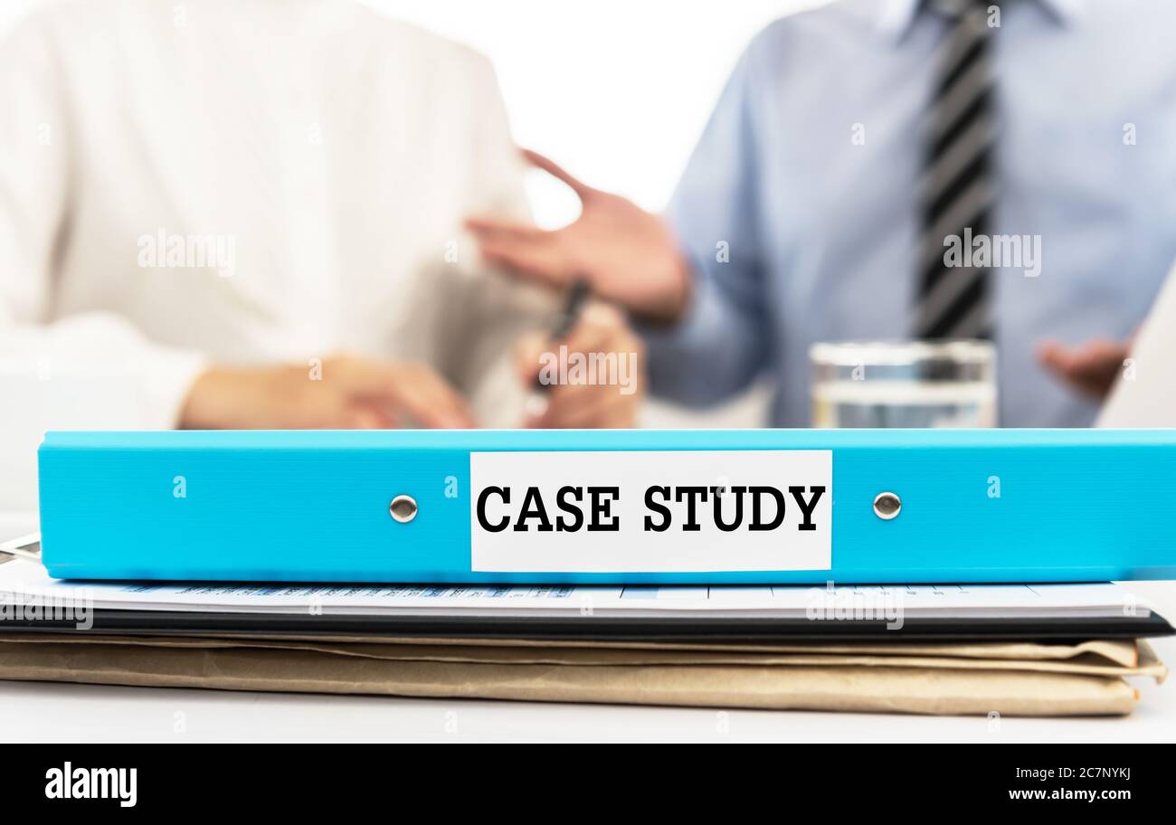 Case study documents folder on desk in meeting room. Concept of study,meeting,training. Stock Photo