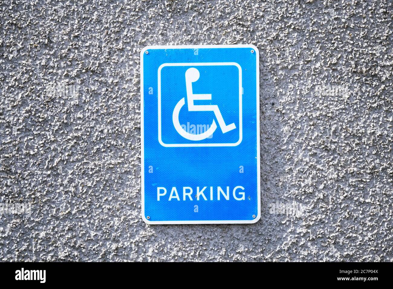 Disabled blue badge holder parking sign for driver Stock Photo Alamy